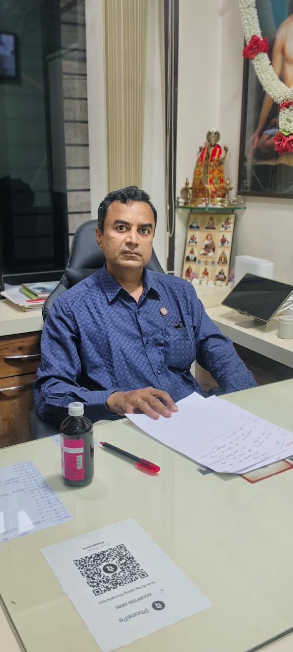 Dr. Prasad Prlhad Aamle in the clinic